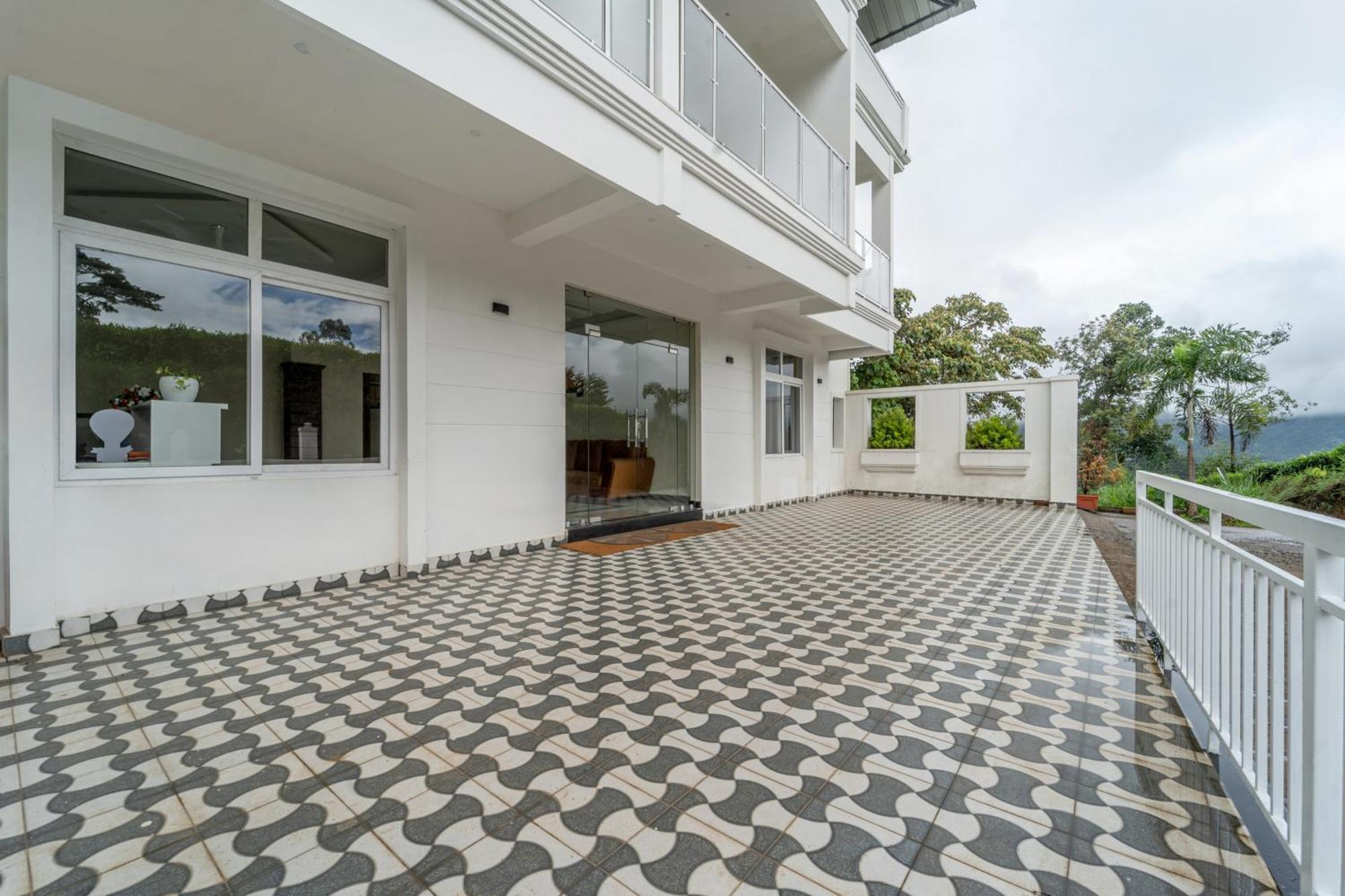 Treebo Windsong Resort Munnar, Tea Plantation View מראה חיצוני תמונה